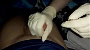 Masturbating in Latex Gloves with a Huge Cumshot from a Foreigner