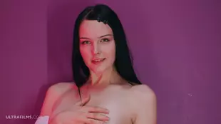 Brunette babe Amelia Riven's sensual solo striptease in an Ultra Films video