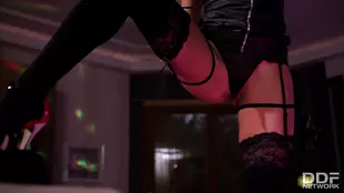Cassie Del Isla's seductive solo striptease using a stripper pole