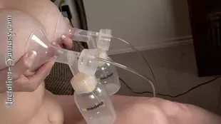 A stunning blonde indulges in her lactation fetish at home