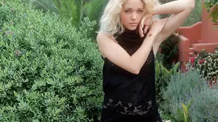 Madonna, a gorgeous blonde, displays her irresistible charm in a video