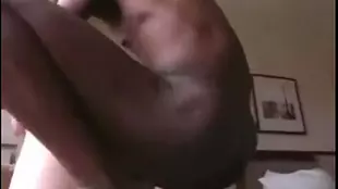 Black pornstar Scrimp displays his big black cock in a webcam threesome