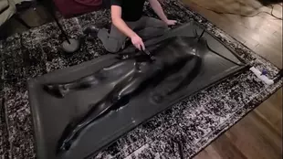 Twink in latex gets a vibrator massage in BDSM video