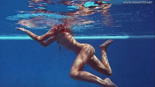 European pornstar Tiffany Tatum swims and jerks off