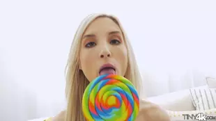 Piper Perri, a stunning American blonde, enjoys solo play with big lollipops on the bed