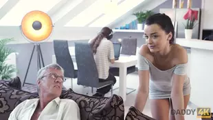 An elderly man has a steamy encounter with a beautiful young female gamer