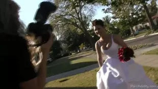 A stunning dark-haired bride enjoys intense lovemaking on her wedding day