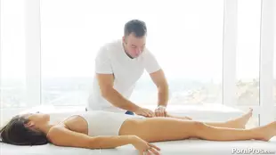 Keisha Grey enjoys a seductive oil massage from a brunette