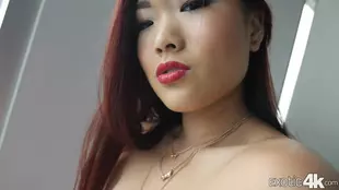 Lea Hart, a young and sexually aroused Asian woman, willingly engages in a sexual encounter with a well-endowed man in this video