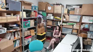 A young woman is disciplined by her boss in a workplace setting