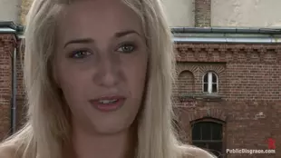 Zenza Raggi, a stunning blonde, endures public embarrassment outdoors